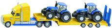 En lastebil med New Holland traktorer i skala 1:87, perfekt for modelleringsentusiaster.