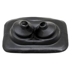 Holdbar mansjett for beskyttelse av traktorens komponenter under trekk.